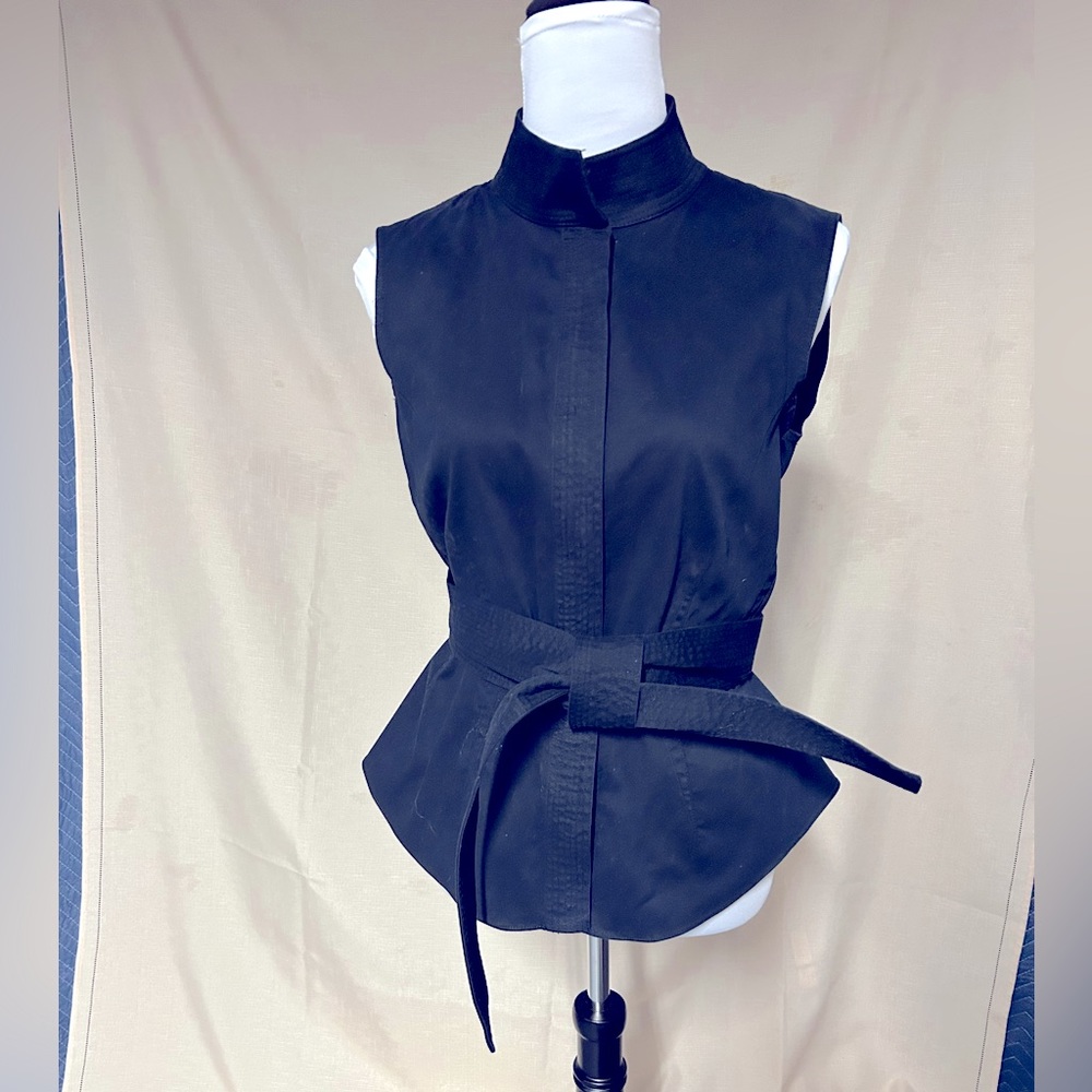 Black Carlisle high neck sleeveless top with peplum and self belt. Size 12